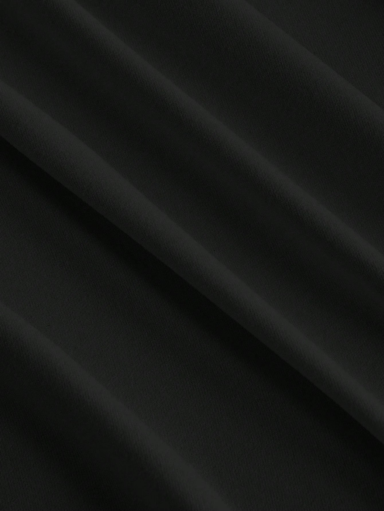 Noiréa – Asymmetrisches Drapier-Top