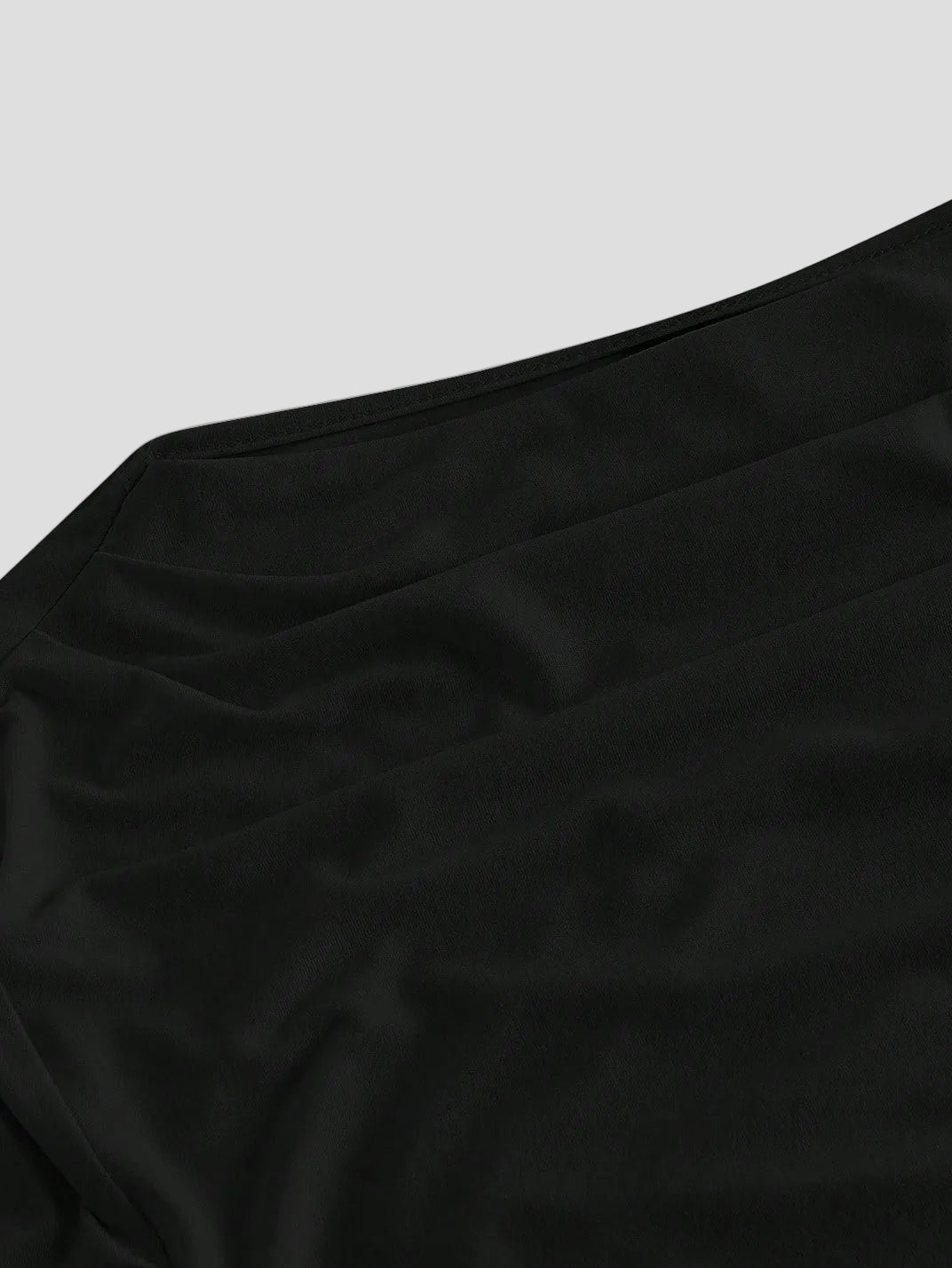 Noiréa – Asymmetrisches Drapier-Top